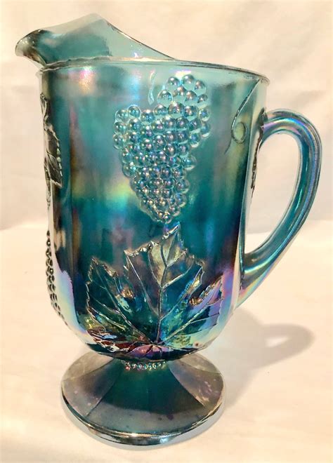 Pattern: Harvest Grape Color: Blue Carnival Manufacturer: Indiana Glass Date Produced: 1970s Shape: Large Pitcher. . Blue carnival glass pitcher value